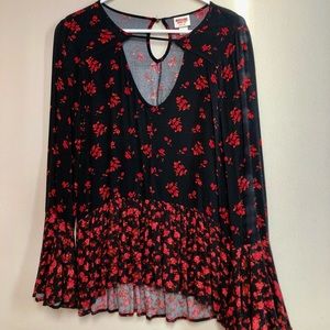 Marked as a small, fits like a medium. In excellent condition. From Target.